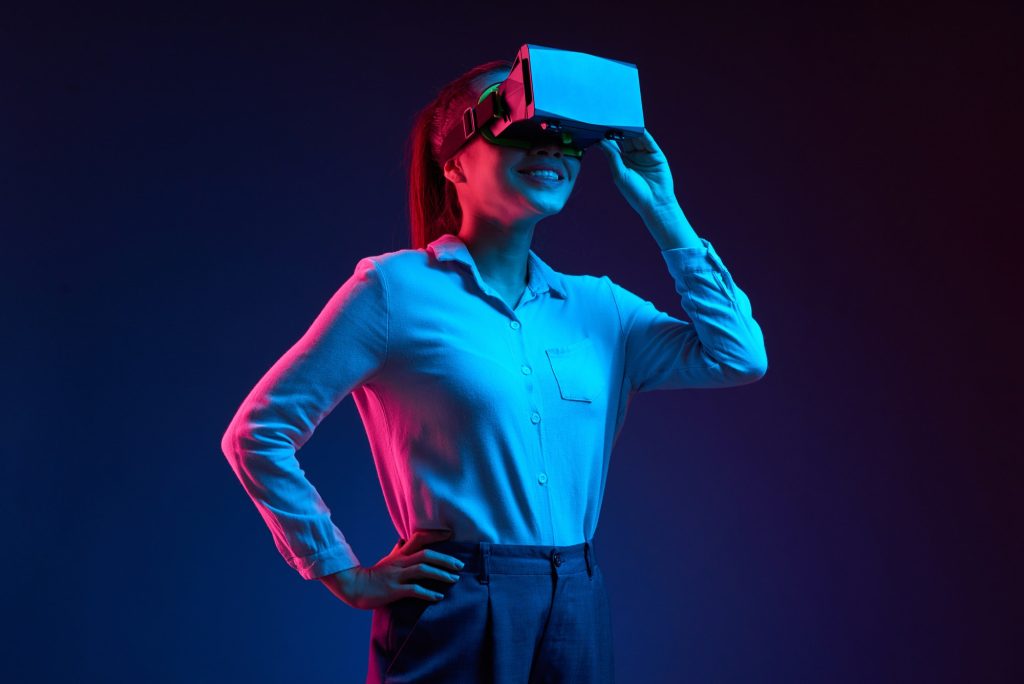 Cheerful woman in vr headset